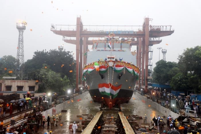 First of the four ships under Survey Vessel (Large) project for Indian Navy launched in the presence of Raksha Rajya Mantri at GRSE, Kolkata ‘Sandhayak’ reinforces Government’s commitment of indigenous shipbuilding and is a big step towards 'Aatmanirbhar Bharat’, says Shri Ajay Bhatt Hopes that it will ensure safe navigation of Indian as well as ships of friendly foreign nations in Indian Ocean Region ‘Sandhayak’, the first of the four Survey Vessels (Large) project being built for the Indian Navy, was launched in Kolkata on December 05, 2021. These Vessels have been designed and developed by Defence Public Sector Undertaking, Garden Reach Shipbuilders and Engineers (GRSE) Limited, which is among the leading warship building companies in India. ‘Sandhayak’ made her first contact with the waters of Hooghly River at 1410 hrs at the Launch Ceremony graced by Shri Ajay Bhatt, Hon’ble Raksha Rajya Mantri. In keeping with the Naval maritime tradition, Smt Pushpa Bhatt, spouse of Shri Ajay Bhatt, launched the ship to the chanting of invocation from Atharva Veda. These survey ships are capable of full scale coastal & deep-water hydrographic survey of Ports & Harbour approaches and determination of navigational channels & routes. These ships are also capable of undertaking survey of maritime limits and collection of Oceanographic & Geographical data for Defence applications, thus boosting the maritime capabilities of the country. These ships are propelled by two Marine Diesel Engines combined with Fixed Pitch Propellers and fitted with Bow & Stern Thrusters for manoeuvring at low speeds during surveys. In their secondary role, these ships would be capable of performing roles such as Search & Rescue and Disaster Relief, besides serving as Hospital ship with limited facilities during emergencies. The ships will have a retractable Hangar for stowage of a Utility helicopter The contract for building four survey ships was signed between MoD and GRSE on 30 Oct 18 at a total cost of Rs 2435 Crs. The ships are fully designed by the Design team of GRSE to meet the requirements of the Indian Navy and are being built utilising the concepts of ‘Integrated Construction’ and in compliance with applicable provisions and regulations of the Classification Society. It has over 80 per cent indigenous content by cost and this will also ensure that large scale defence production is executed by Indian manufacturing units, thereby generating employment and expertise within the country.